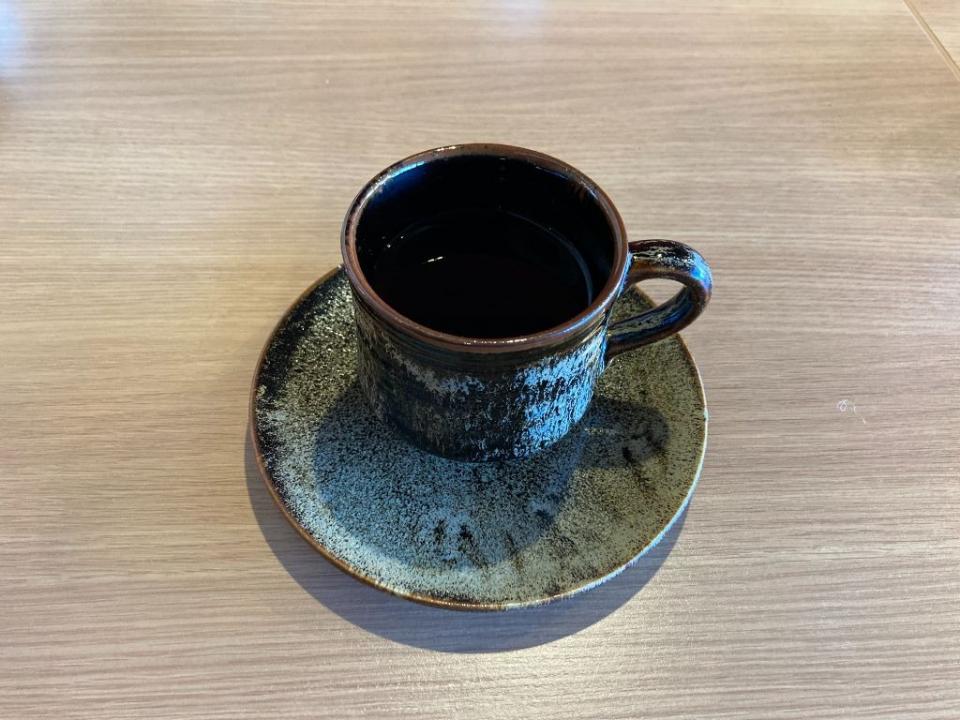 写真：コーヒーが入ったカップ